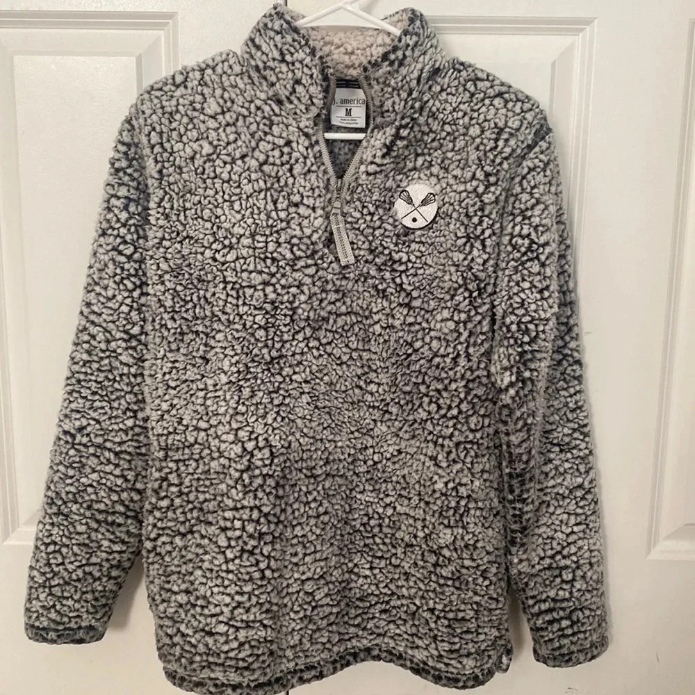 J.America Lacrosse Sherpa quarter zip pullover size medium black cream